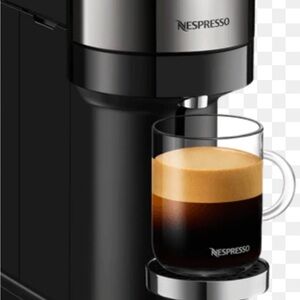 Nespresso Black and Silver Coffee Maker with Glass Cup
